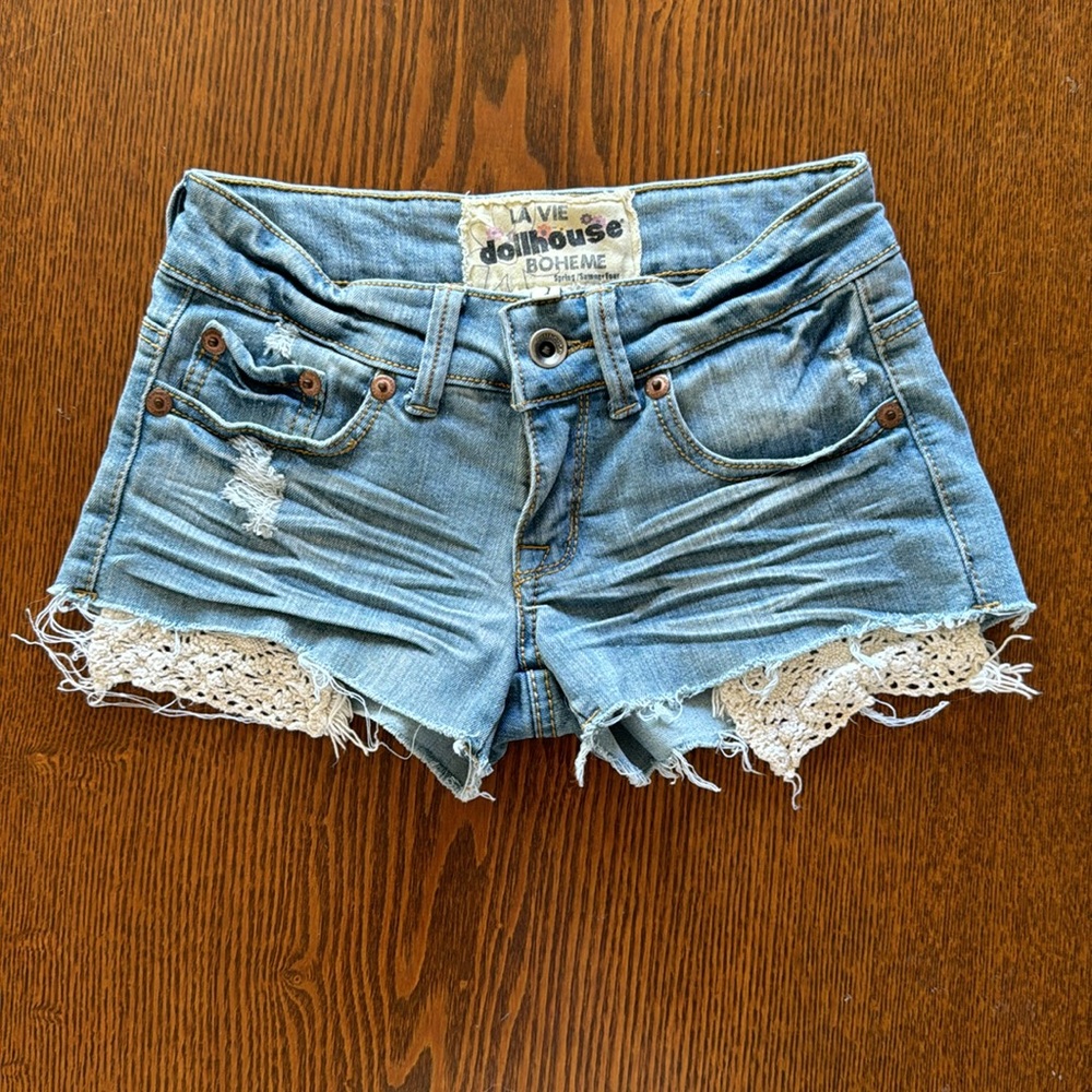 Very short shorts. Denim with lace trim. size 1.